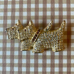 Vintage Napier Scottish dogs gold tone brooch.